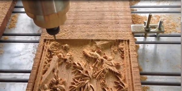 nhận khắc gỗ bằng máy CNC