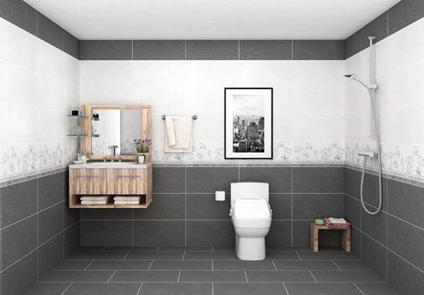 Nhà vệ sinh được sơn màu xám trắng đơn giản và thanh lịch