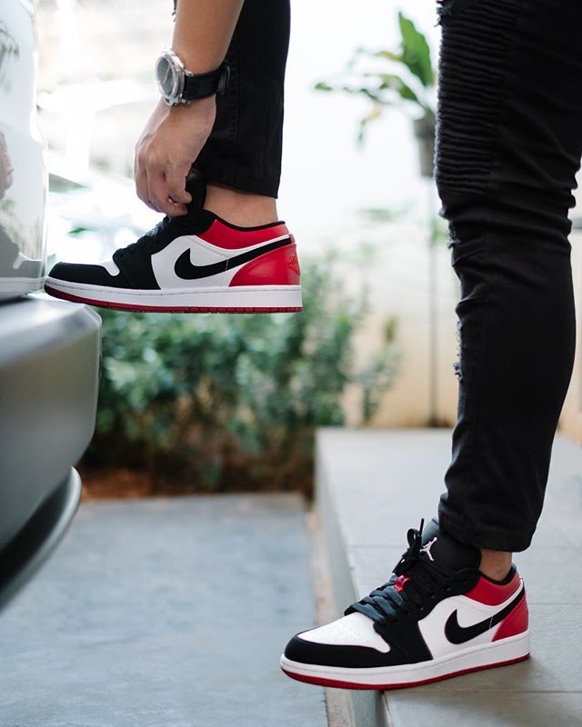 Nike Air Jordan 1 Low Black Toe on feet