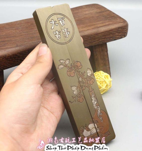 Chặn giấy đồng