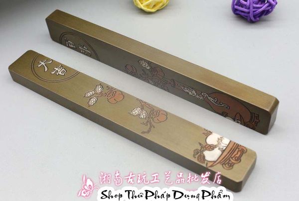 Chặn giấy đồng