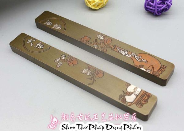 Chặn giấy đồng