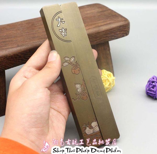 Chặn giấy đồng