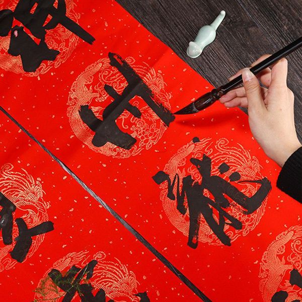 Giấy viết câu đối đỏ tết