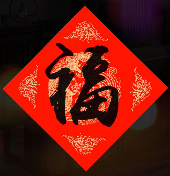 Giấy xuyến đỏ viết câu đối hình rồng phượng