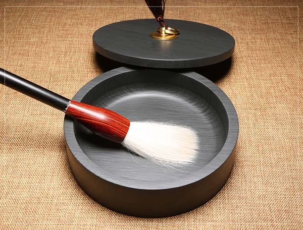 Nghiên đá nguyên khối viên chì