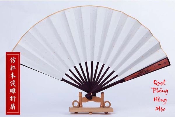 Quạt gỗ khắc hoa văn giấy xuyến chỉ