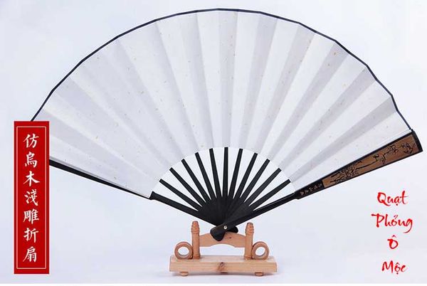 Quạt gỗ khắc hoa văn giấy xuyến chỉ