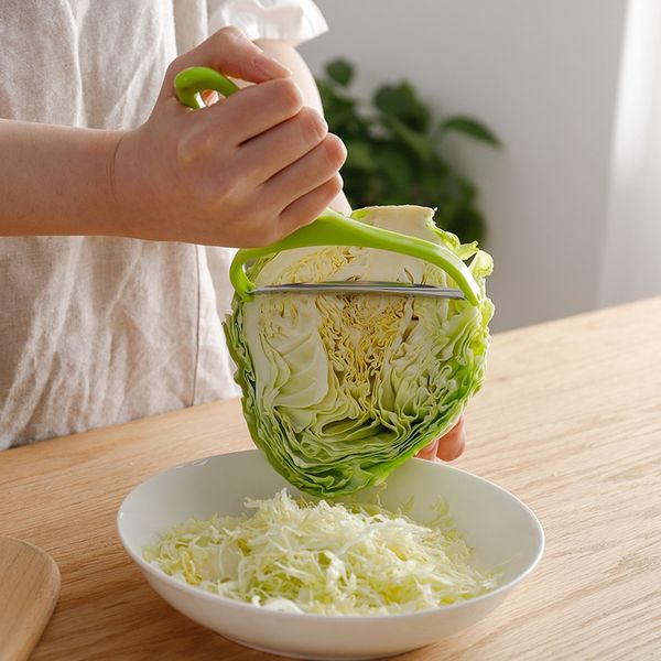 Cabbage is large, heavy, and can be eaten raw and cooked.