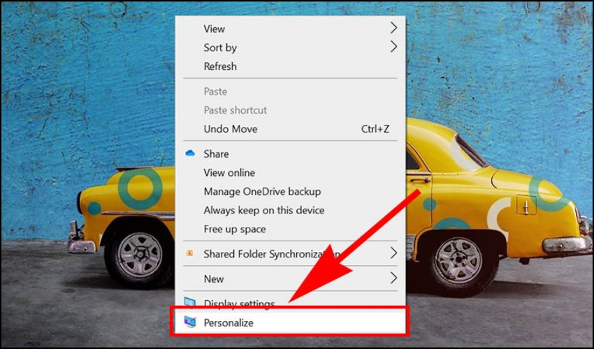 Click chuột phải trên màn hình Desktop và chọn Personalize