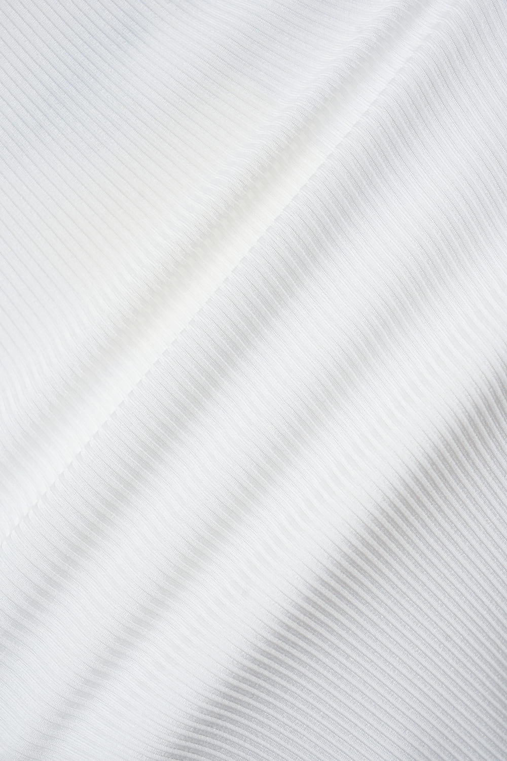 Áo tăm tay lỡ cổ tròn cúc vai trang trí