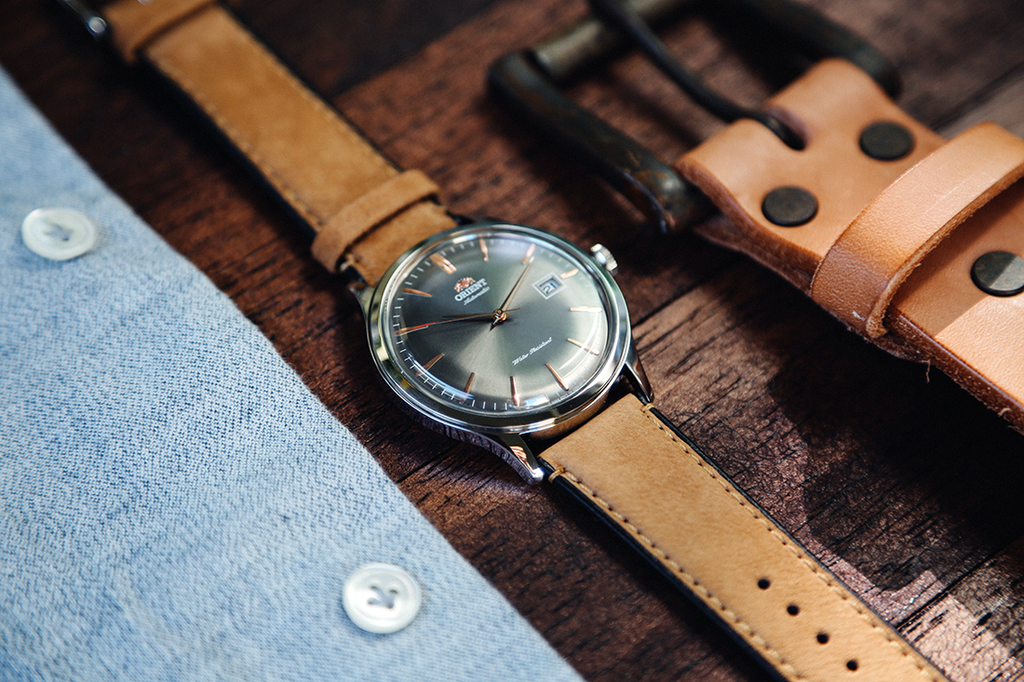 Tổng hợp các thế hệ đồng hồ Orient Bambino kính cong ảo diệu