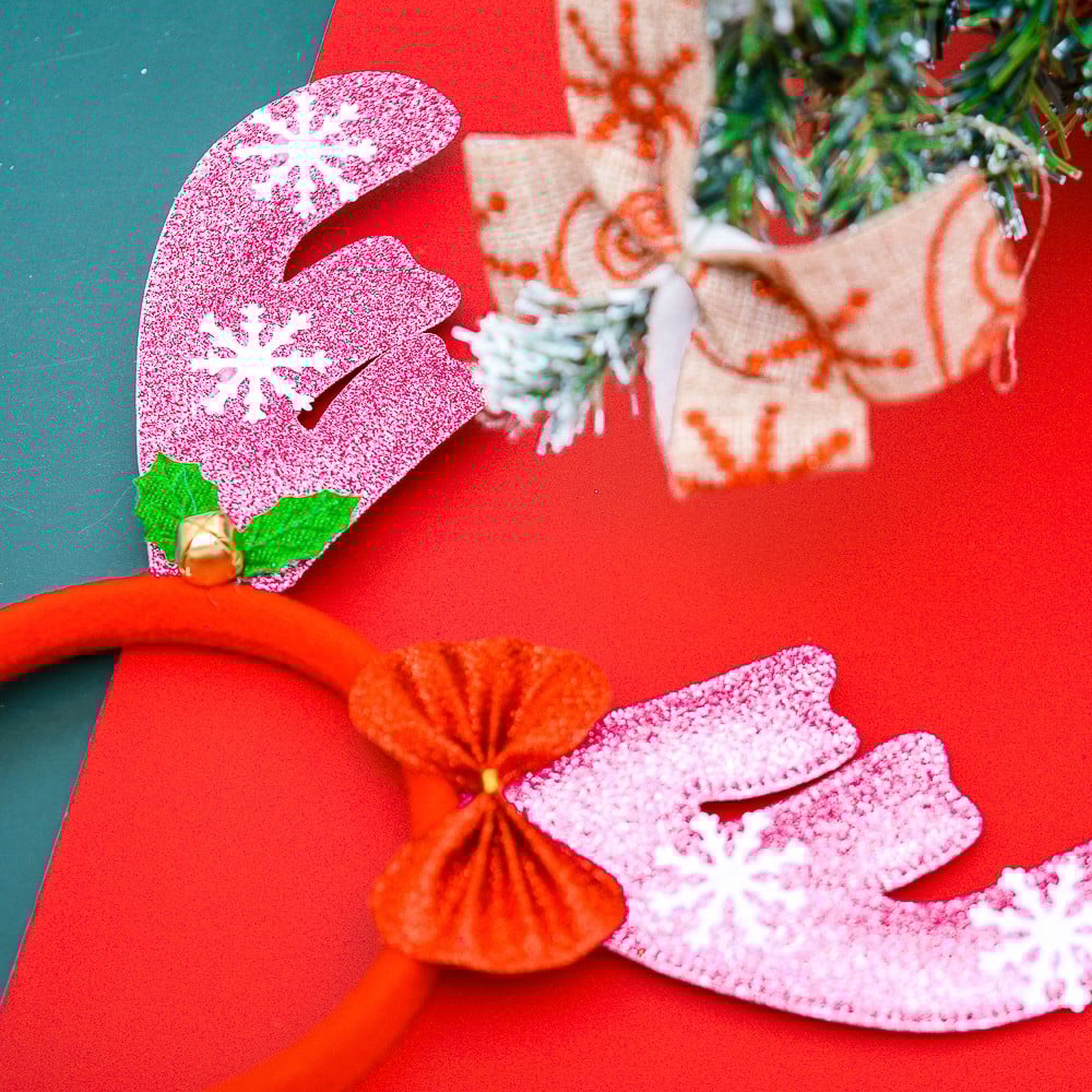 Cài tóc Noel tai nơ chuông kim tuyến