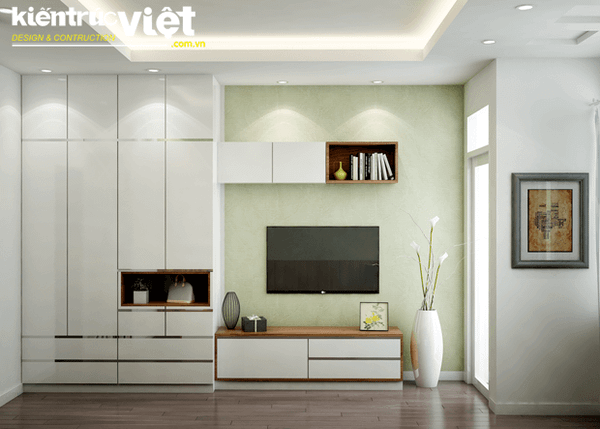 Không gian phòng khách và nhà bếp được tách biệt bằng một chiếc bàn ăn nhỏ dành cho 2 người, một sự bố trí thông minh khi kết hợp cả 3 không gian phòng khách, phòng ăn và nhà bếp trong một diện tích nhỏ