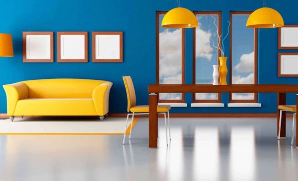 Phòng khách trông ấn tượng, nổi bật với màu vàng gold và xanh dương đậm