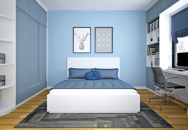 Phòng ngủ được sơn cùng tone màu xanh
