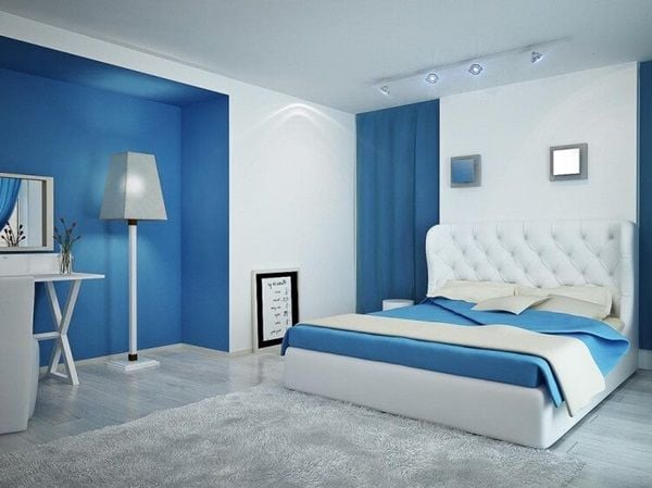 Phòng ngủ được phối 1 màu xanh với độ đậm nhạt khác nhau trong từng chi tiết