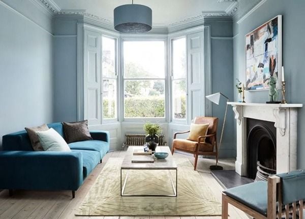 Màu sơn xanh dương làm chủ đạo cho phòng khách sẽ tạo cảm giác hòa hợp