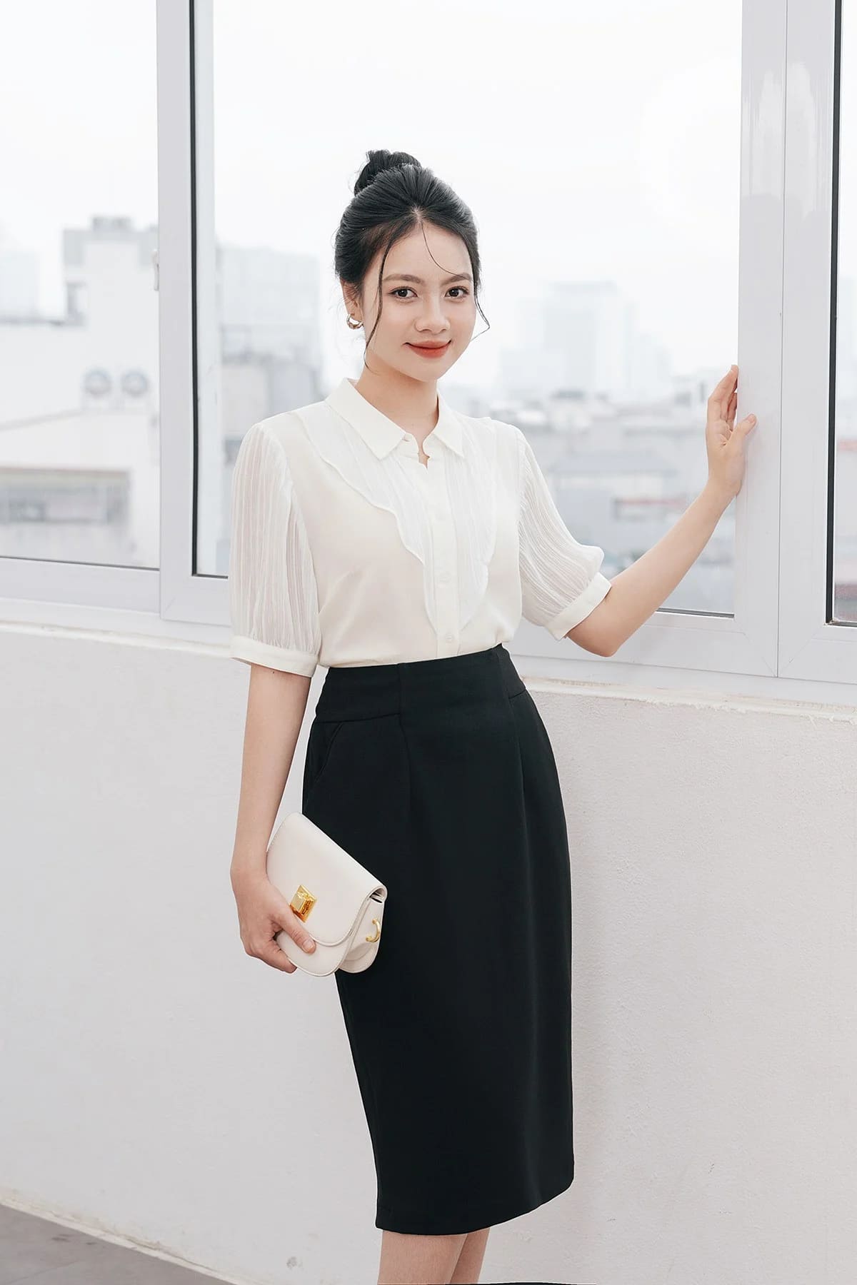 chân váy công sở dài qua gối tone đen