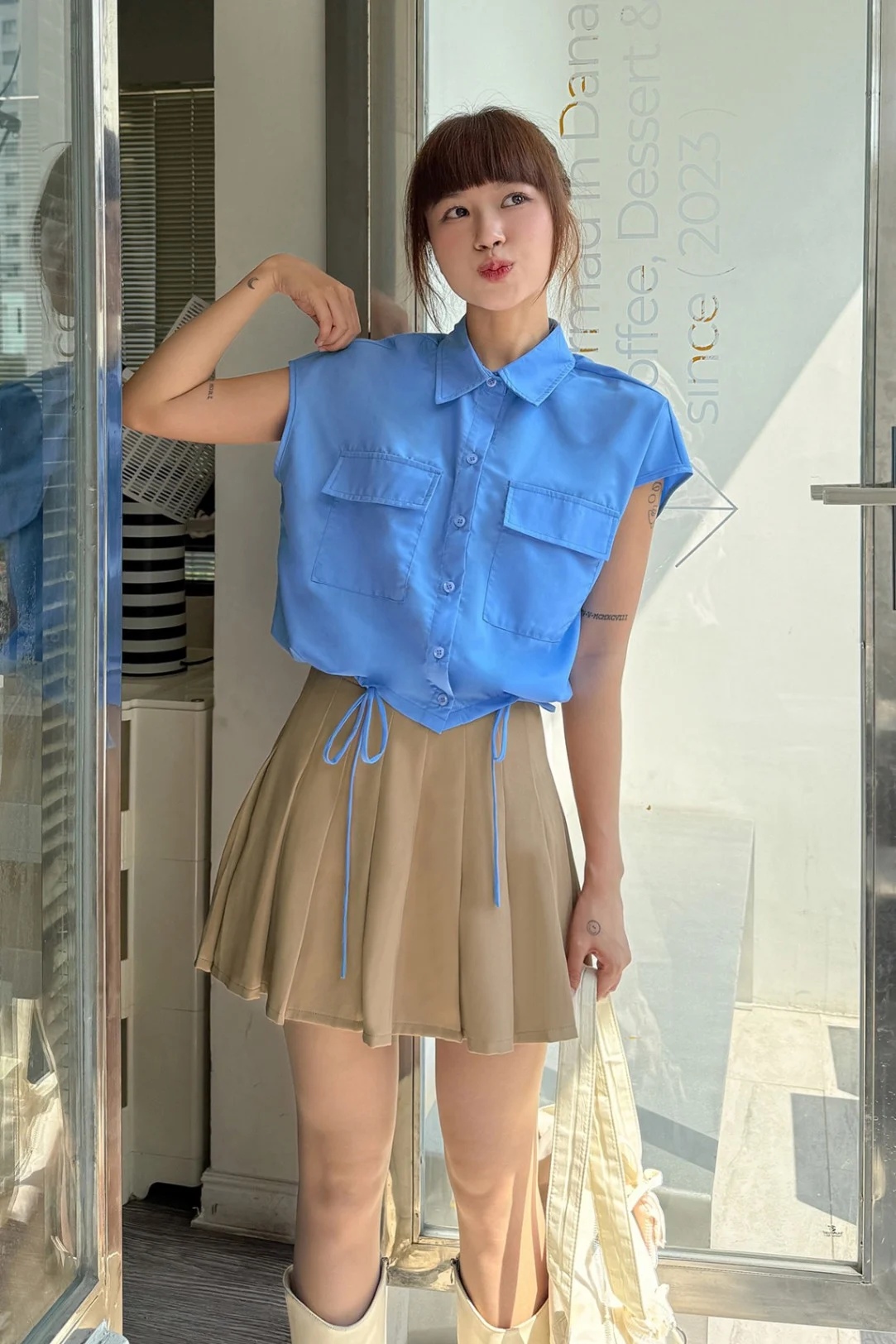 Người thấp nên chọn sơ mi dáng ngắn để tránh nuốt dáng