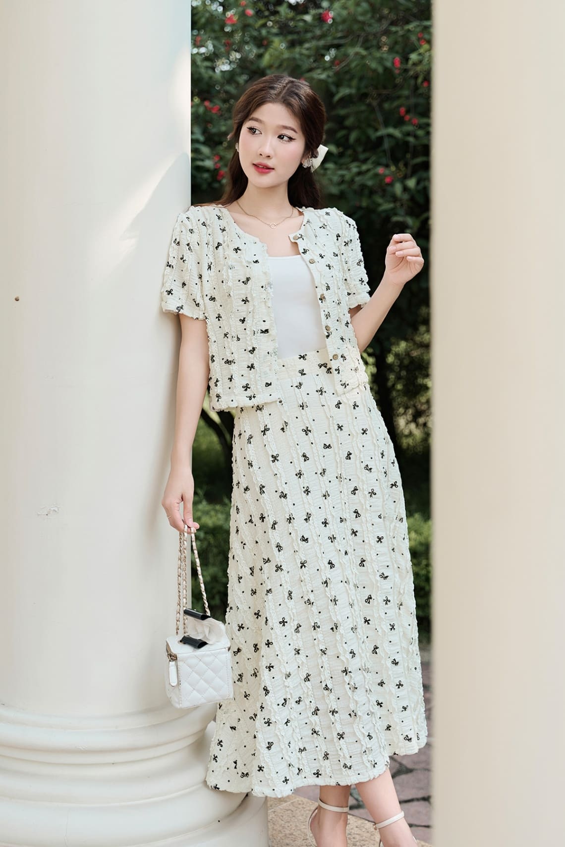 Chân váy xòe dài nơ phối áo tay ngắn đồng bộ