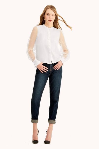 Áo blouse phối voan cũng hoàn toàn có thể tạo ra trở thành một mix đồ gia dụng giản dị nhưng mà vẫn thú vị Khi kết phù hợp với quần jean sống lưng cao.