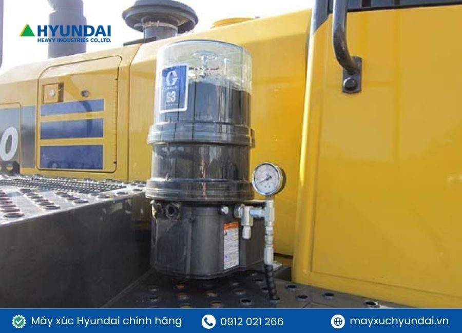bơm mỡ máy xúc