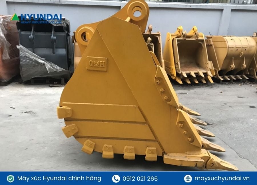 gầu máy xúc