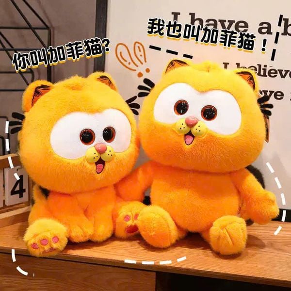 Gấu bông mèo cam Garfield thiết kế dễ thương, mang lại sự vui vẻ cho trẻ em và người yêu đồ chơi nhồi bông