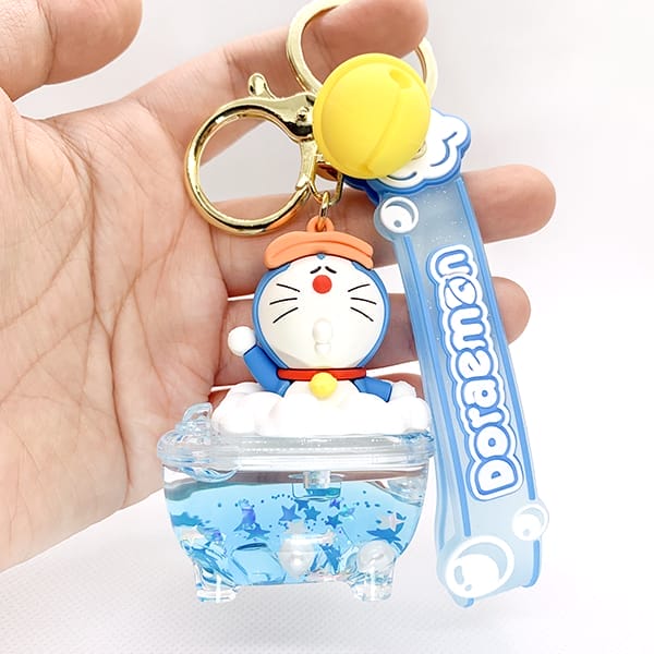 Mua móc khóa nước kim tuyến bling bling hình Doraemon thư giãn