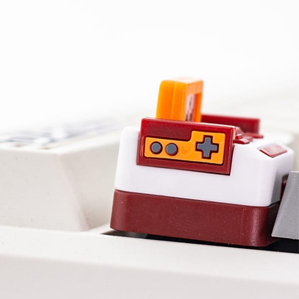 Nút keycap hình máy game retro tuổi thơ máy băng Famicom