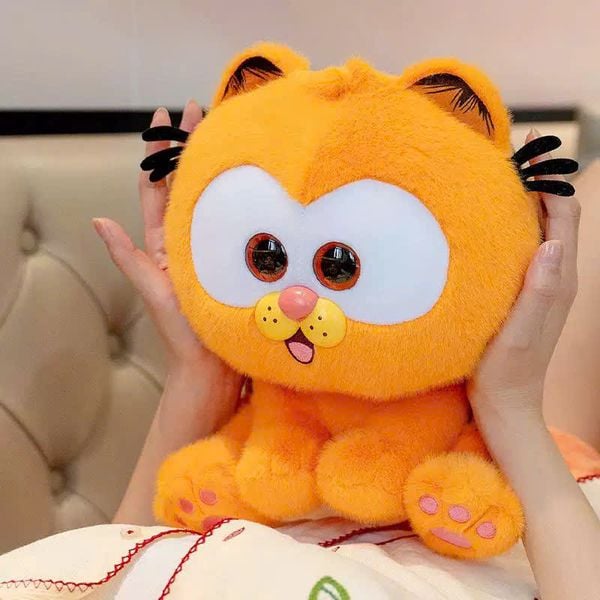 Tăng thêm phần ngọt ngào cho bộ sưu tập của bạn với Gấu bông mèo cam Garfield đáng yêu và tinh tế