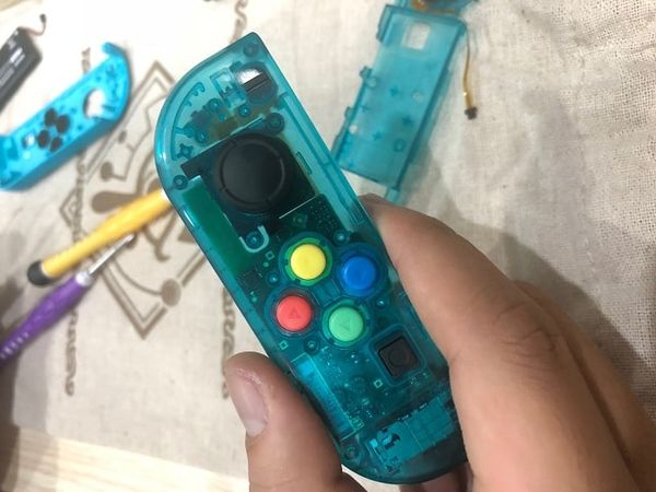 Thay Joycon trong suốt cho Nintendo Switch màu xanh ngọc