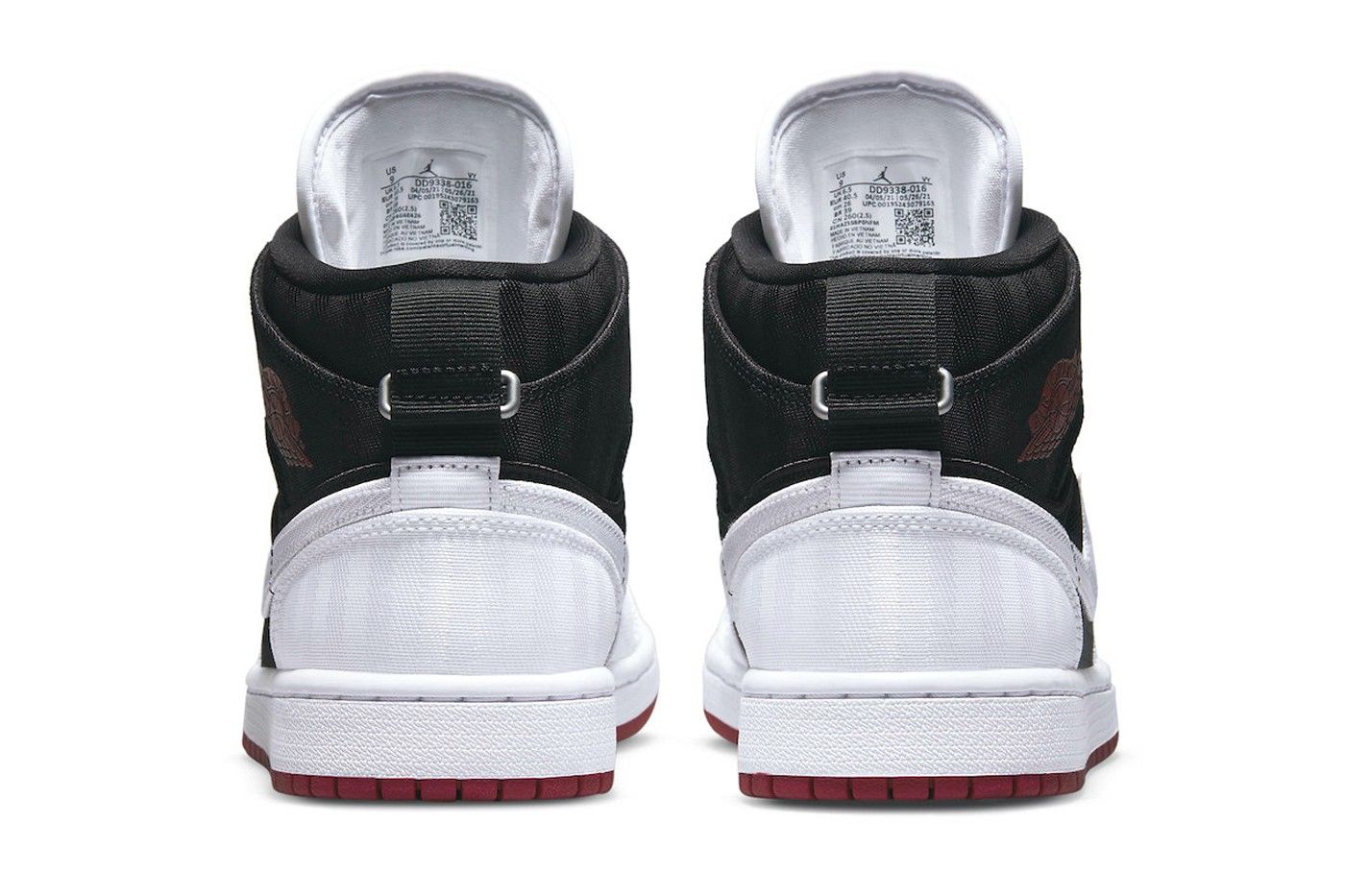 air-jordan-1-mid-se-trong-mot-tong-mau-trang-den-holy-toan-moi