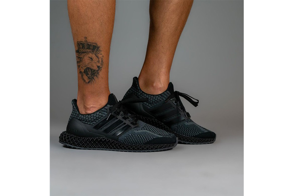 adidas ultra 4d triple black on feet