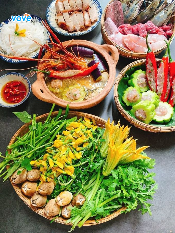 lẩu mắm cá linh ăn vào trời mưa thì nhức cái nách rồi