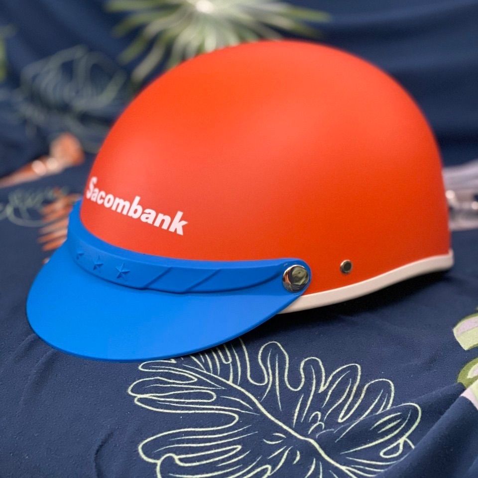 Mẫu nón bảo làm hiểm làm quà tặng khách hàng màu cam phối xanh