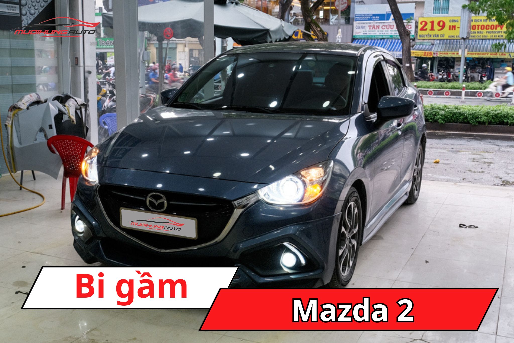 Bi gầm Mazda 2