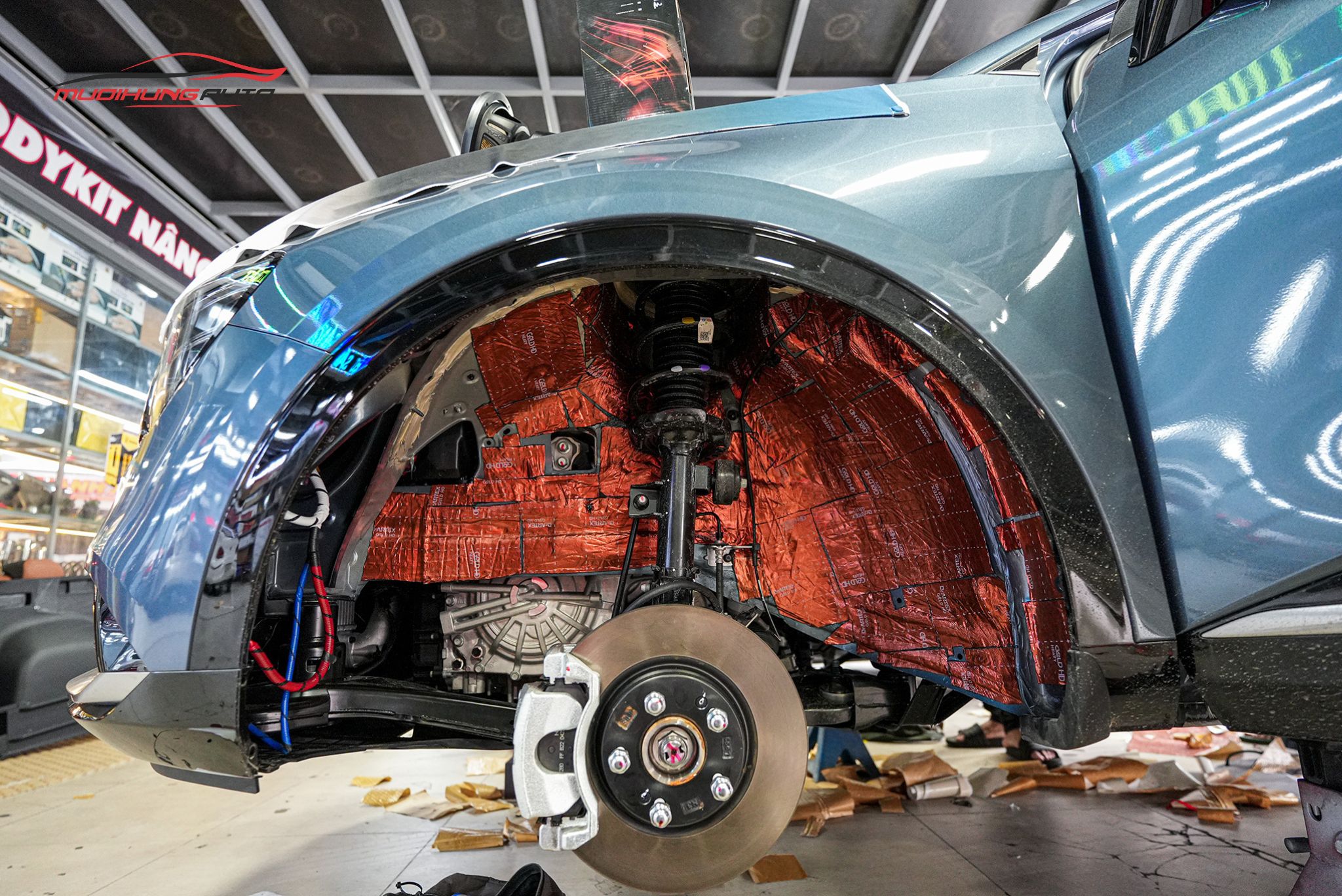 Cách âm hốc bánh Kia Sportage 2022