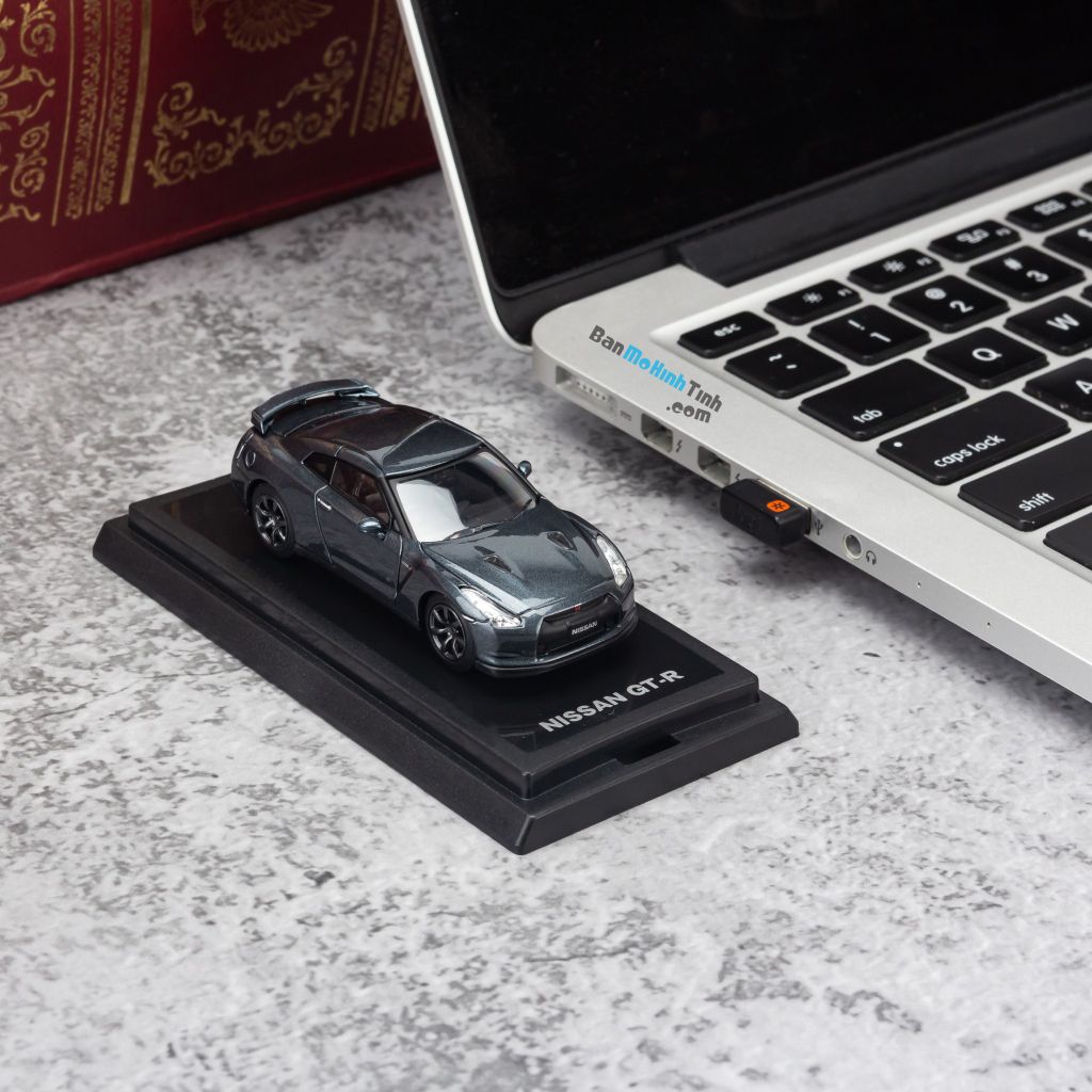Mô hình xe Nissan GTR 1:64 Dealer Grey giá rẻ