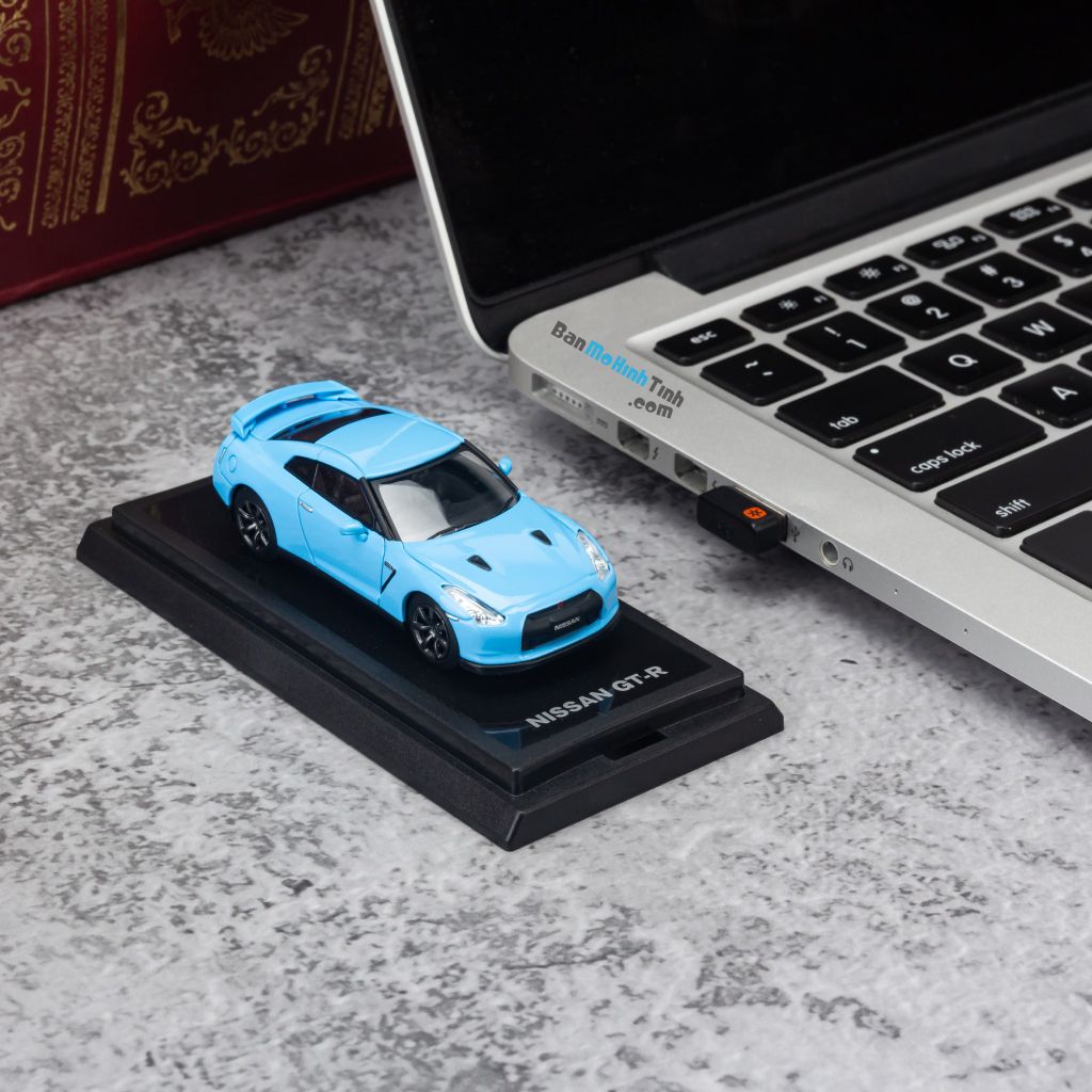 Mô hình xe Nissan GTR 1:64 Dealer Light Blue giá rẻ