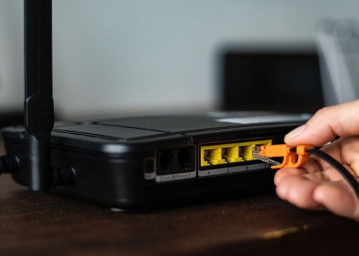 Thực hiện khởi động lại router