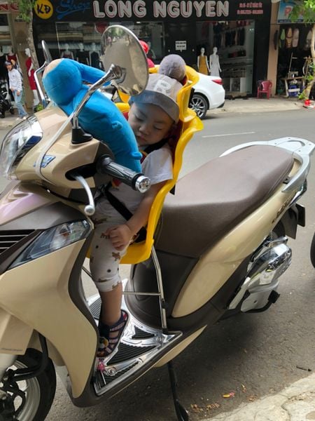 Junbaby: Ghế ngồi xe máy cho bé