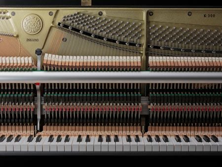 các phím đàn piano cơ nặng hơn piano điện 
