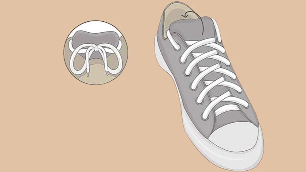 Cách giấu dây giày kiểu buộc giấu nút thắt