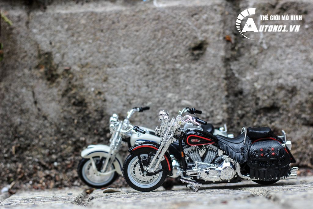 MÔ HÌNH HARLEY DAVIDSON 1998 FLSTS HERITAGE SPRINGER 1:18 MAISTO 3614