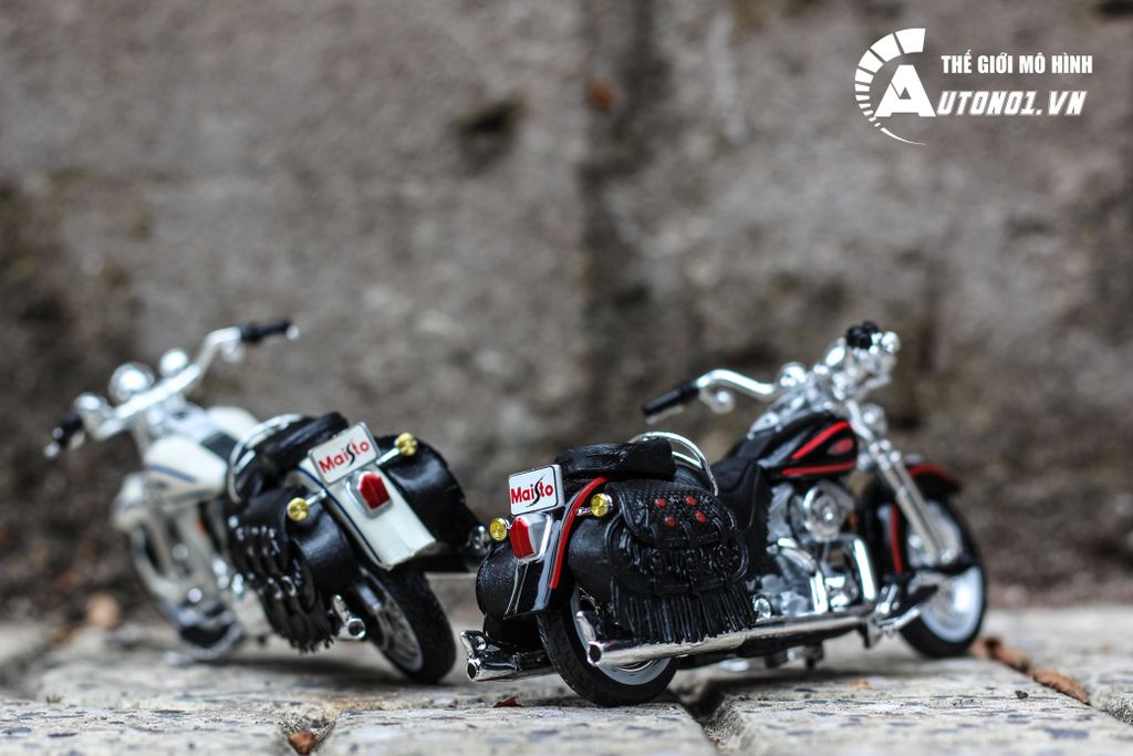 MÔ HÌNH HARLEY DAVIDSON 1998 FLSTS HERITAGE SPRINGER 1:18 MAISTO 3614