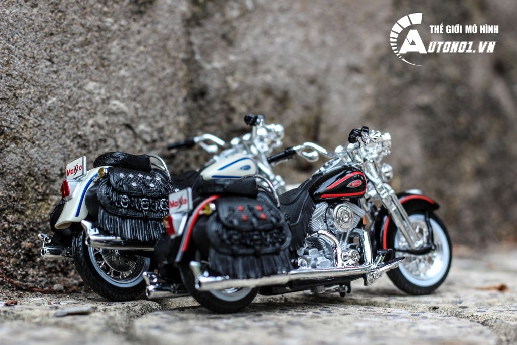 MÔ HÌNH HARLEY DAVIDSON 1998 FLSTS HERITAGE SPRINGER 1:18 MAISTO 3614