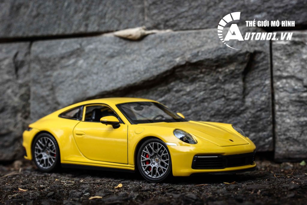 MÔ HÌNH XE PORSCHE 911 CARRERA 4S YELLOW 1:24 WELLY 7250