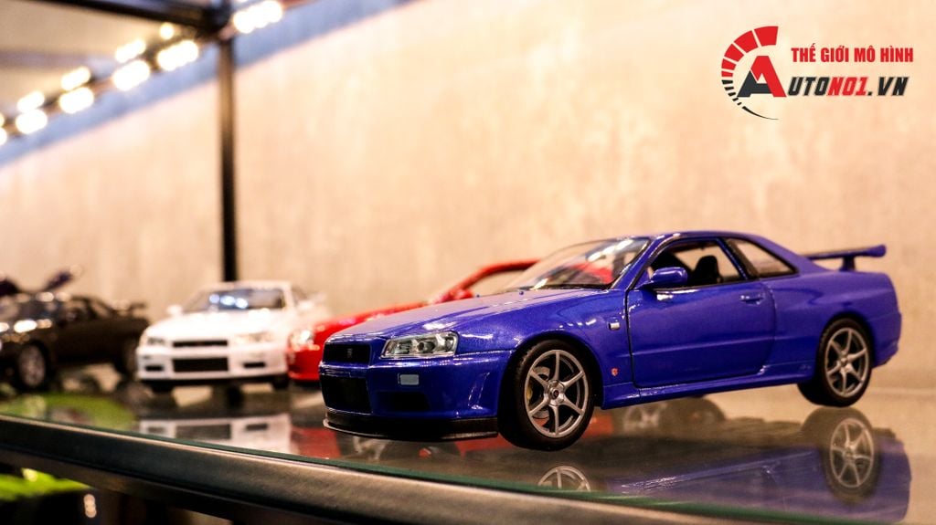 MÔ HÌNH XE NISSAN SKYLINE GT-R R34 BLUE 1:24 WELLY 7450